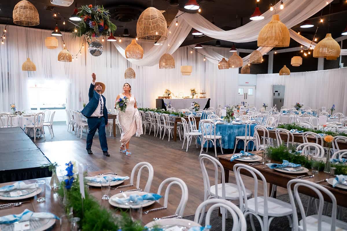 bride and groom view reception decor at historical society of Topsail Island North Carolina