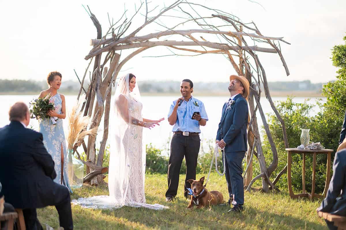 bride and groom saying vows at Topsail Beach Wedding planned by Local Revival