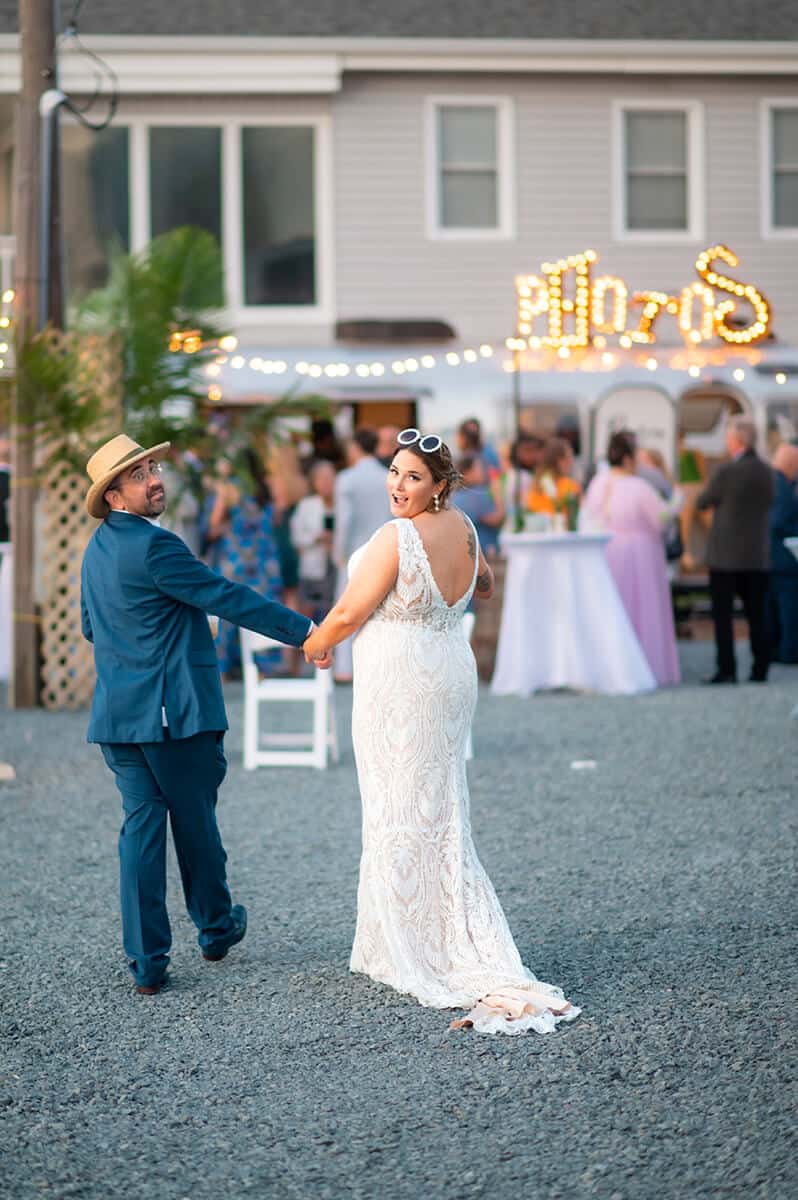 Bride and Groom at reception party Topsail Beach NC wedding coordination by Local Revival